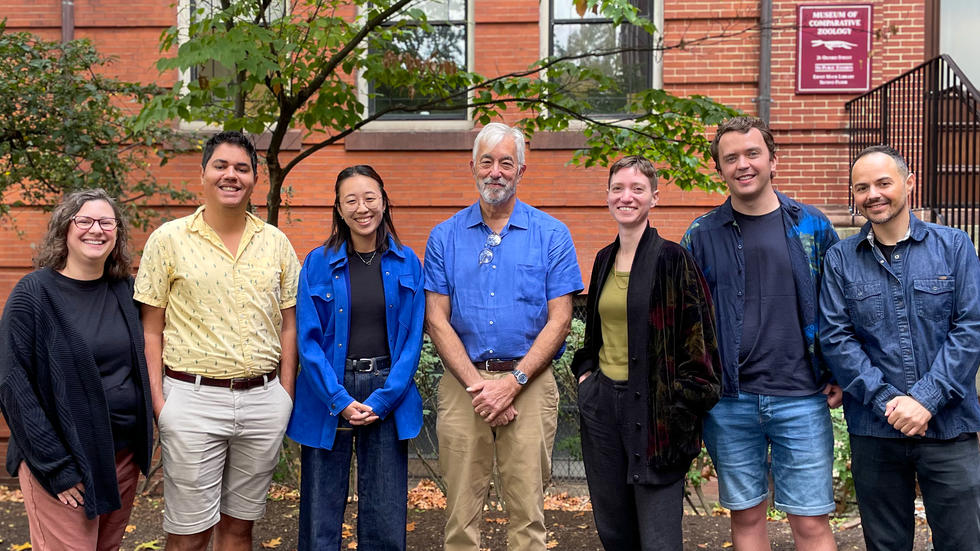 Farrell Lab photo in front of brick wall, 2024