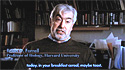 Screenshot of video, showing Brian D. Farrell sitting in office, speaking